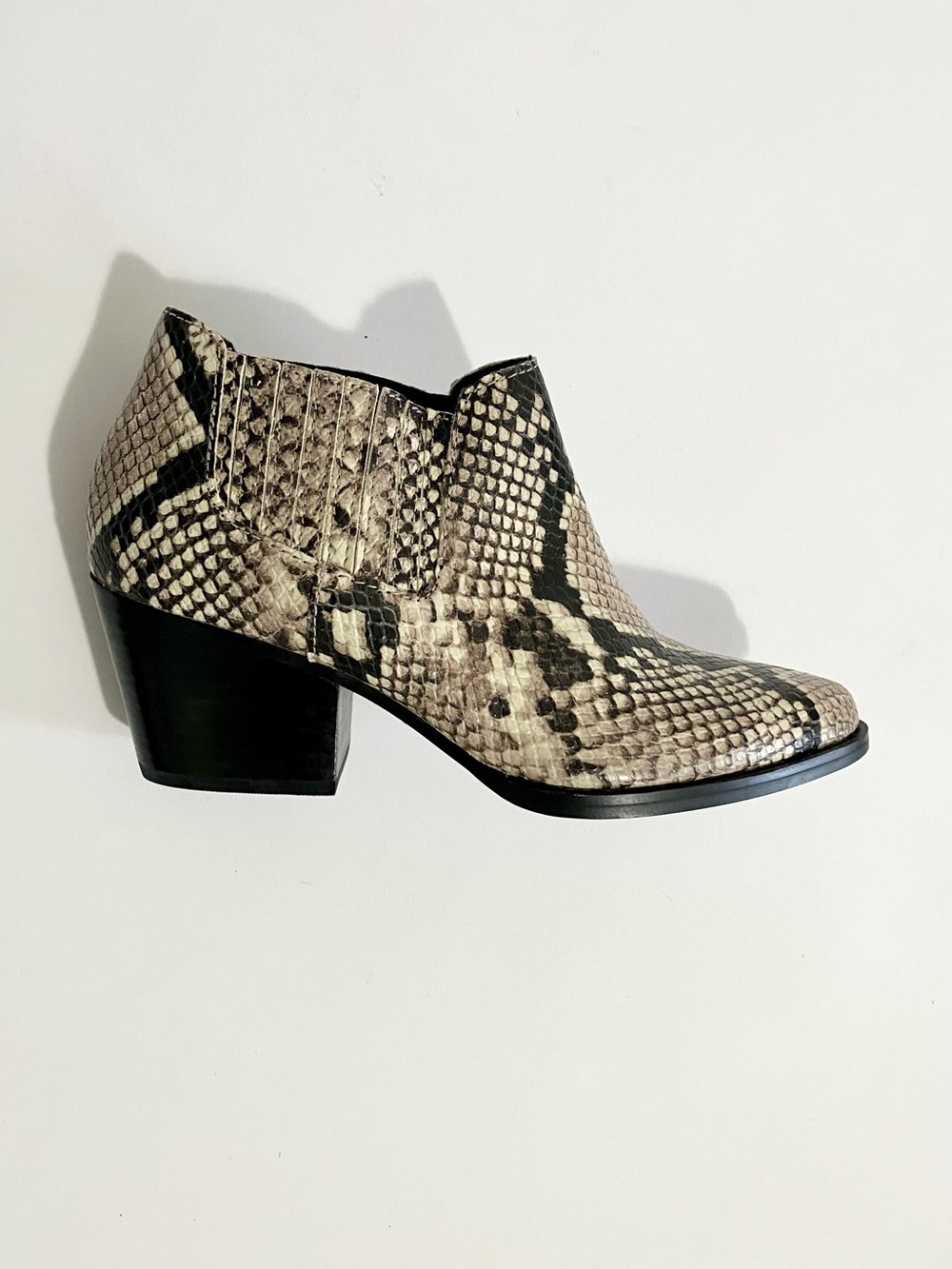 Aldo Snake-Print Ankle Booties in Black and Cream